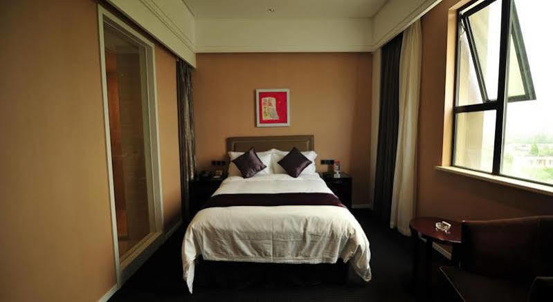 Shanghai New Century Manju Hotel Luoshan @Sniec Exterior photo